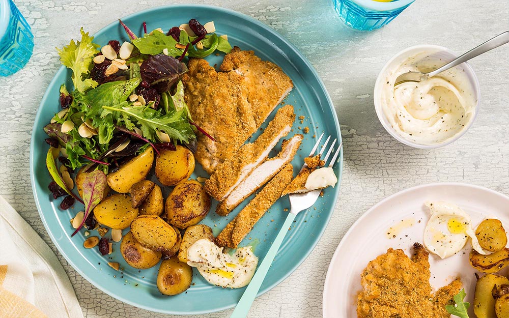 Oven Baked Chicken Ranch with potatoes and cranberry-almond greens,
